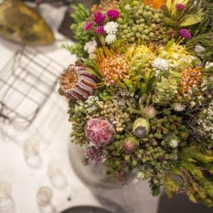 Wild and organic African Soul bouquet crafted with fresh greenery and textured seasonal elements.