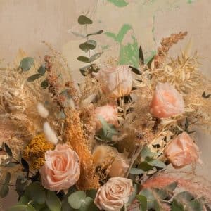 Close-up of Pompeya preserved bouquet highlighting roses, eucalyptus, and pampas grass in a timeless design.
