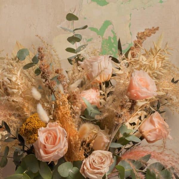 Close-up of Pompeya preserved bouquet highlighting roses, eucalyptus, and pampas grass in a timeless design.